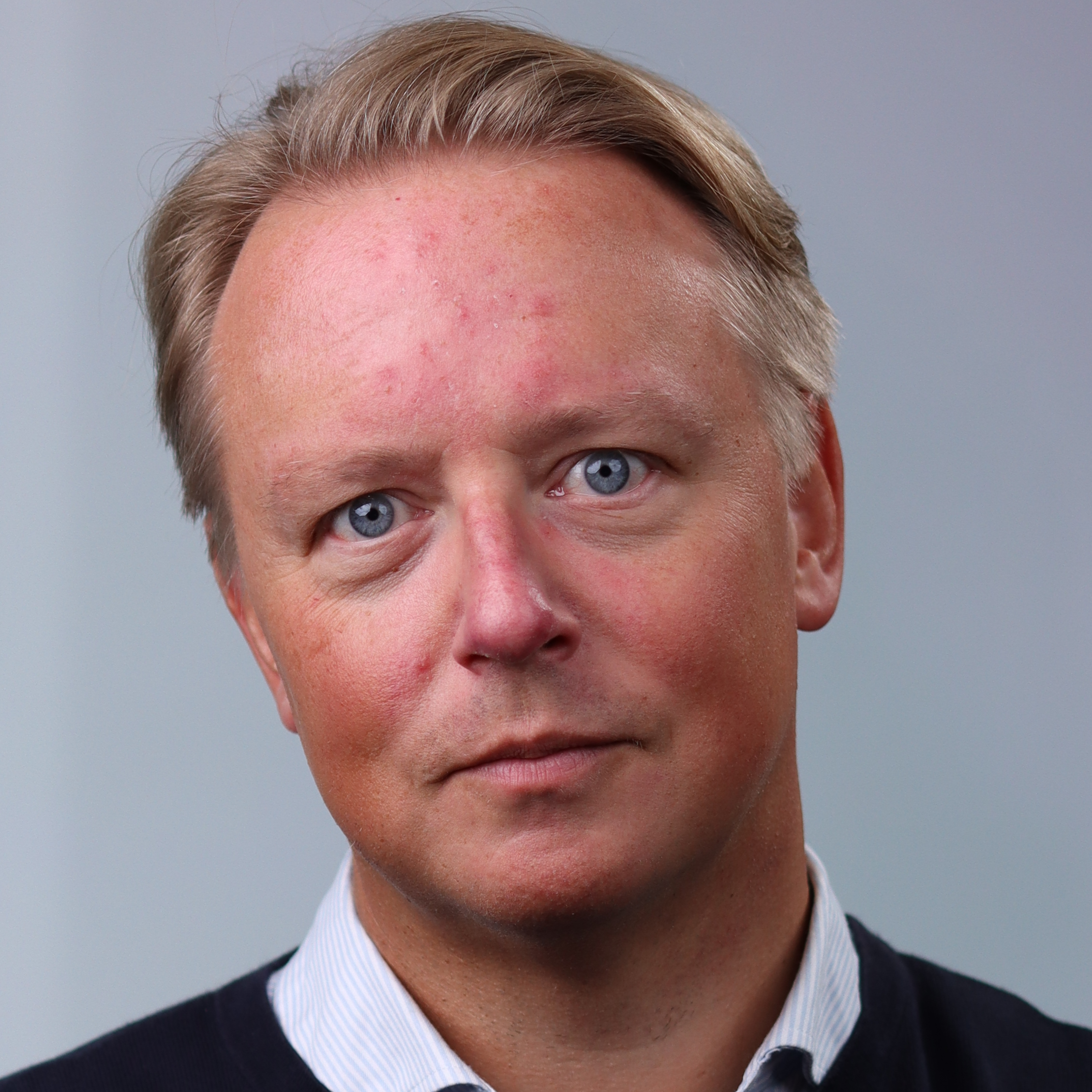 Porträttbild av Johan Axhamn